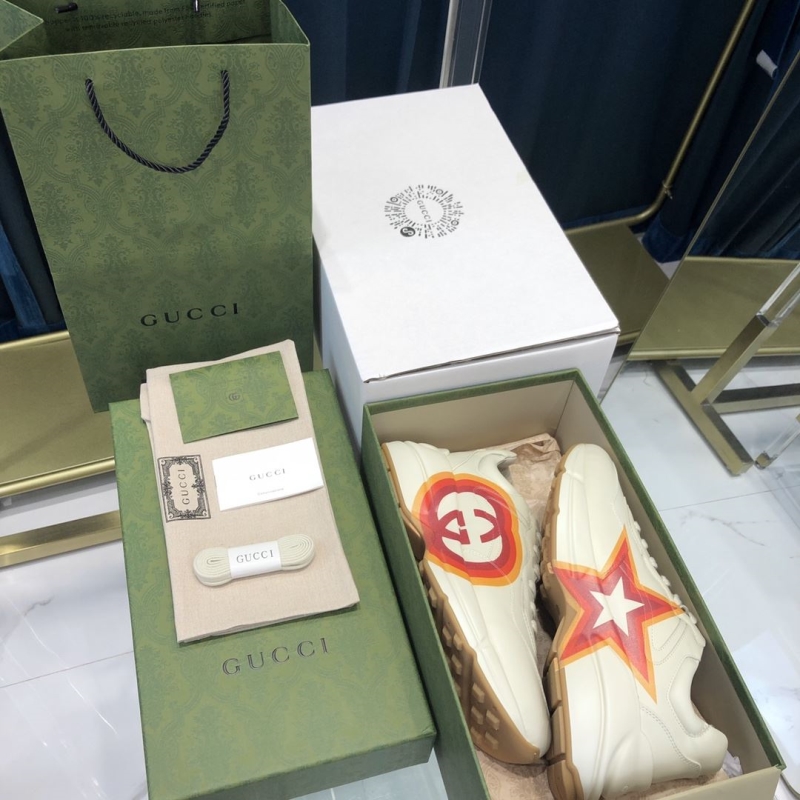 G*u*i sneakers